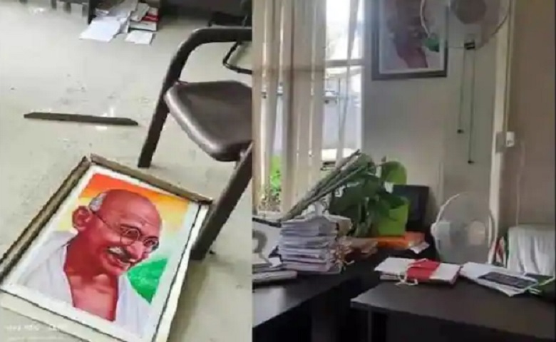 vandalising Mahatma Gandhi’s portrait