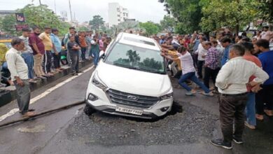 car got stuck in collapsed road