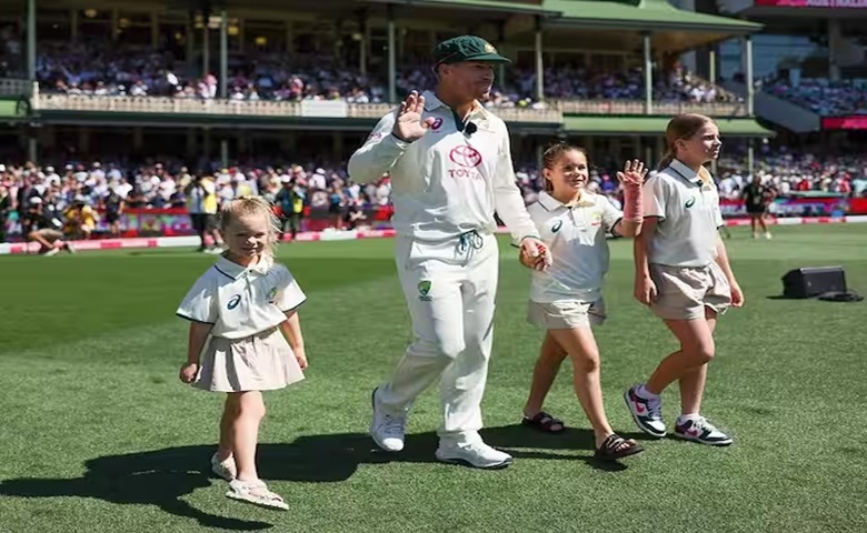 David Warner with daughters