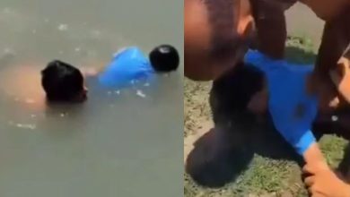 Saved child floating in water